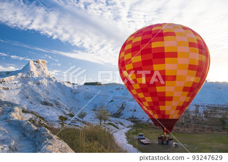Hot air balloon flying over Travertine pools limestone terraces Pamukkale Turkey 93247629