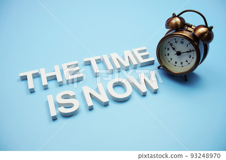 The Time is Now alphabet letters on blue background The Time is Now alphabet letters on blue background 93248970
