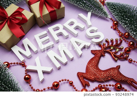 Merry XMAS alphabet letters with Christmas decorate on purple background Merry XMAS alphabet letters with Christmas decorate on purple background 93248974