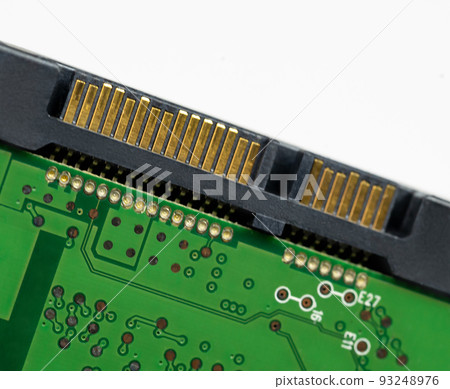 An internal Hardisk drive in 3.5 size isolated on white closed up on the SATA connection. 93248976
