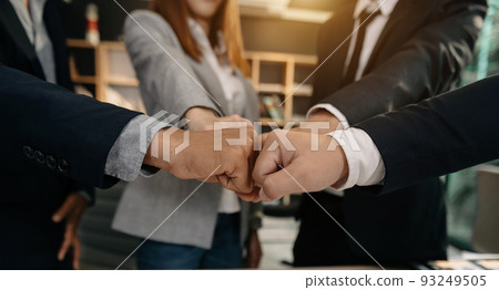 Business handshake closing a deal with blur background of people 93249505