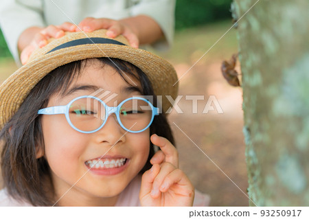 Sunflower field and child girl 93250917