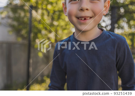 boy jumping on a trampoline boy jumping on a trampoline 93251439