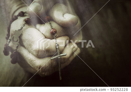Old wrinkled woman hands holding a rosary. Closeup of christian woman hands holding rosary while praying God. Old wrinkled woman hands holding a rosary. Closeup of christian woman hands holding rosary while praying God. 93252228