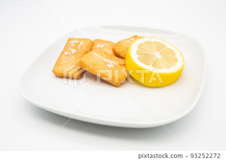 Traditional Sicilian panelle on dish. Typical Sicilian street food. White Background. Traditional Sicilian panelle on dish. Typical Sicilian street food. White Background. 93252272