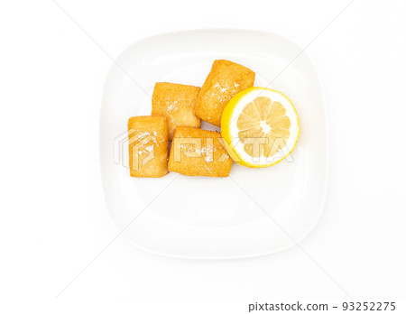 Traditional Sicilian panelle on dish. Typical Sicilian street food. White Background. 93252275