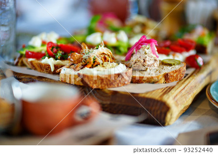 sandwiches with pate and vegetables. catering for the holiday. 93252440