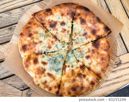 top view of Ossetian pie with egg and herbs top view of Ossetian pie with egg and herbs 93255299