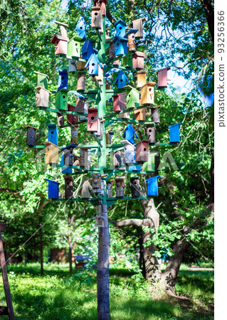 a lot of birdhouses on the pole a lot of birdhouses on the pole 93256366
