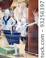 Mannequins in the shop window dressed in school uniforms 93256397