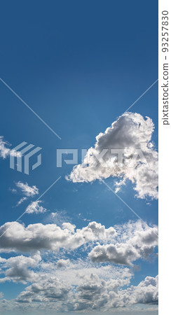 Fantastic clouds against blue sky, panorama 93257830