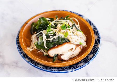 Mushrooms and wakame seaweed 93257862