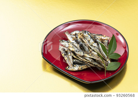 New Year's dishes 12_Tazukuri in a red plate_Background gold New Year's dishes 12_Tazukuri in a red plate_Background gold 93260568