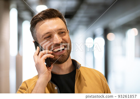 Smiling Business Man Talking On Phone Communicating At Workplace 93261857