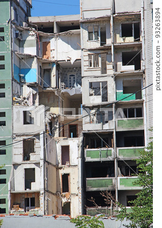 multi-storey building in Chernihiv where rocket hit. dilapidated apartment building 93263894