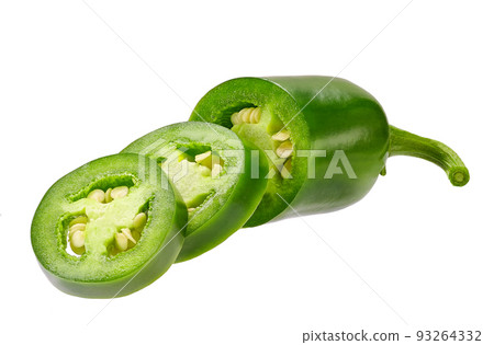 fresh green cut chili pepper pieces isolated on white background. fresh green cut chili pepper pieces isolated on white background. 93264332