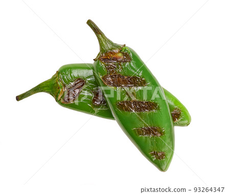 two grilled jalapeno chili pepper isolated on white background. two grilled jalapeno chili pepper isolated on white background. 93264347