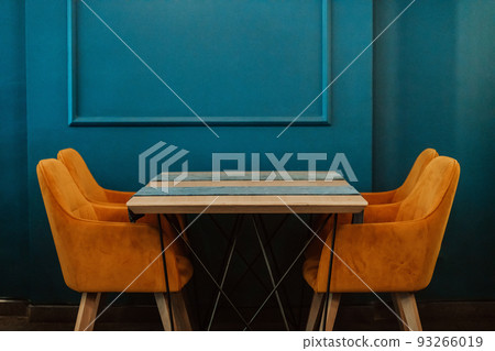 Modern furniture with a matte wall in the background. Selective focus  93266019