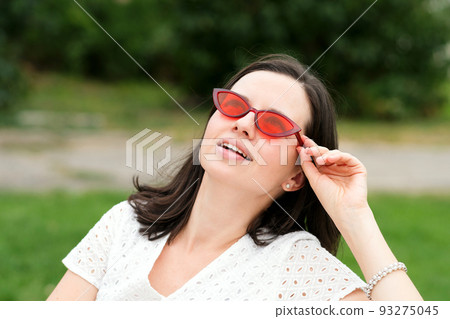Woman portrait outdoors Woman portrait outdoors 93275045