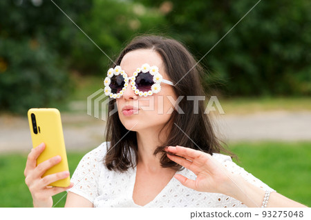 Woman makes selfie Woman makes selfie 93275048