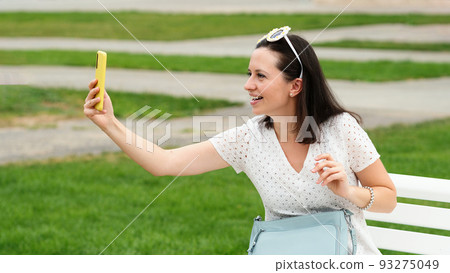 Woman makes selfie Woman makes selfie 93275049
