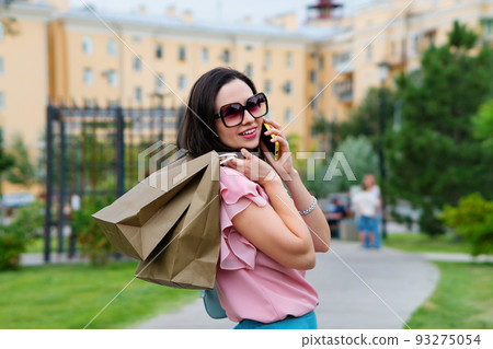 Caucasian business woman shopaholic 93275054