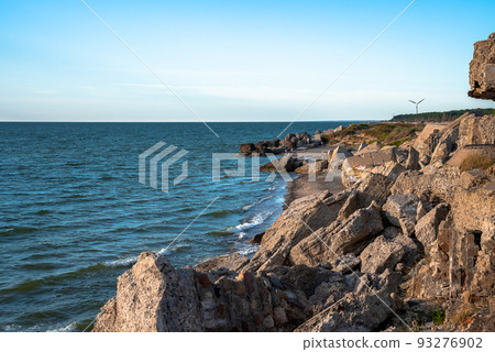 Ruins of bunkers on the beach of the Baltic sea, part of an old fort 93276902