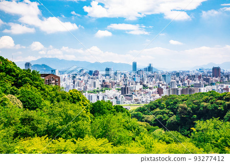 A view of the southeast direction of Hiroshima City from the vicinity of the hill (Ryuo Park) in the western part of Hiroshima City. You can see the Seto Inland Sea. 93277412
