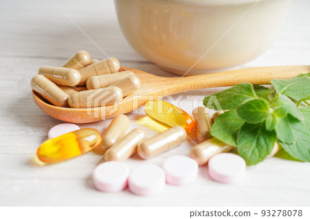 Alternative medicine herbal organic capsule with vitamin E omega 3 fish oil, mineral, drug with herbs leaf natural supplements for healthy good life. 93278078