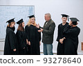 The rector of the university, a professor of mathematics, personally congratulates each of the graduates of the students, congratulates them on the completion of their studies 93278640