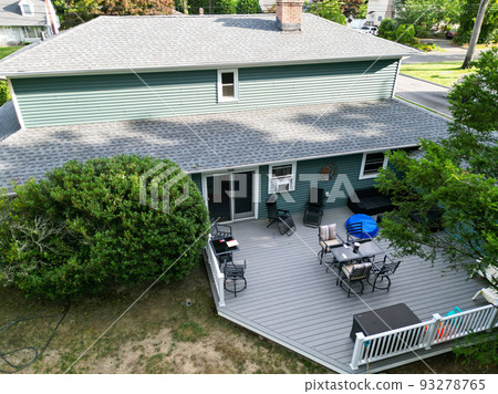 Looking down at backyard with a composite deck on a residential house Looking down at backyard with a composite deck on a residential house 93278765