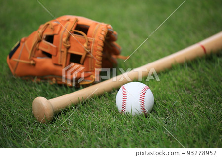 Baseball equipment placed on the lawn Baseball equipment placed on the lawn 93278952