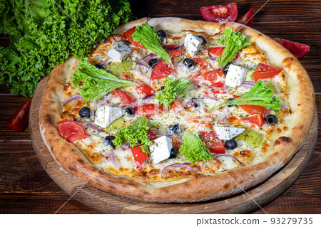 Pizza with bacon and cheese, herbs and cherry tomatoes. With mozzarella, shrimp and octopus, mussels and other products on a wooden background. Pizza with bacon and cheese, herbs and cherry tomatoes. With mozzarella, shrimp and octopus, mussels and other products on a wooden background. 93279735