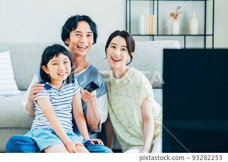 Young family watching tv 93282253