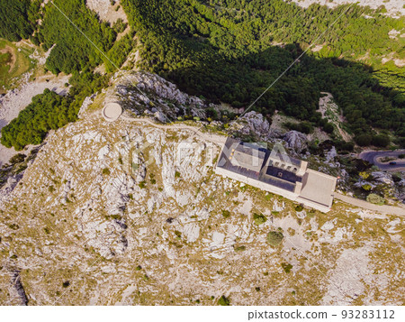 Montenegro. Lovcen National Park. Mausoleum of Negosh on Mount Lovcen. Drone. Aerial view. Viewpoint. Popular tourist attraction. Petar II Petrovic-Njegos mausoleum on the top of mount Lovchen in 93283112