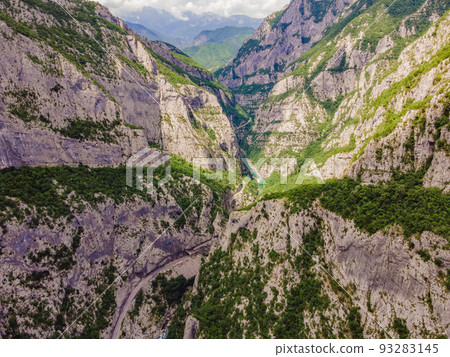 The purest waters of the turquoise color of the river Moraca flowing among the canyons. Travel around Montenegro concept Portrait of a disgruntled girl sitting at a cafe table 93283145