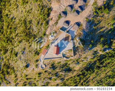 The Church of St. Sava in Montenegro, near the island of Sveti Stefan near Budwa. Drone view. Location: church St. Sava, Montenegro, Balkans, Adriatic sea, Europe Portrait of a disgruntled girl The Church of St. Sava in Montenegro, near the island of Sveti Stefan near Budwa. Drone view. Location: church St. Sava, Montenegro, Balkans, Adriatic sea, Europe Portrait of a disgruntled girl 93283154