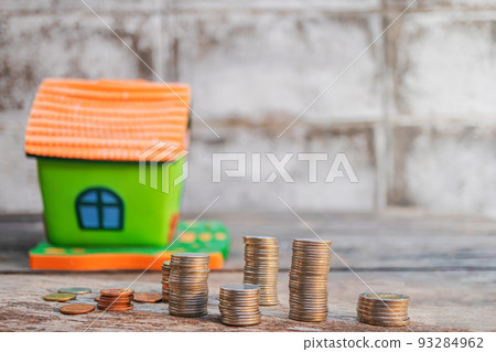 Money-saving concepts for future property purchases, ideas for loans, property ladder, finance, mortgage, real estate investments, taxes and bonuses. 93284962