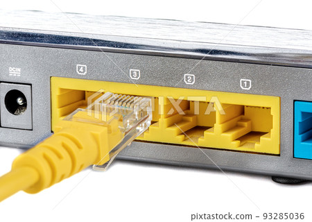 Connecting an Ethernet RJ45 cable to the LAN port. 93285036