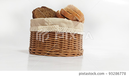 Vine wicker basket isolated on white background. Bread basket Vine wicker basket isolated on white background. Bread basket 93286778