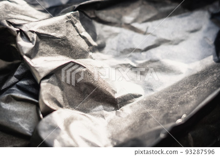 Abstract real paper surface background. Aluminum Platinum Silver foil. Wrinkled crumpled folds bend crush crease kink. Crystal, polygonal texture wave futurism 80s retro style new year. Brown tone 93287596