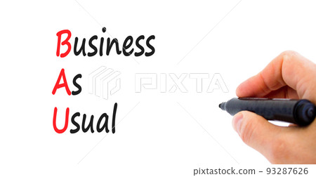 BAU business as usual symbol. Concept words BAU business as usual on a beautiful white background. Businessman hand. Business and BAU business as usual concept. Copy space. BAU business as usual symbol. Concept words BAU business as usual on a beautiful white background. Businessman hand. Business and BAU business as usual concept. Copy space. 93287626