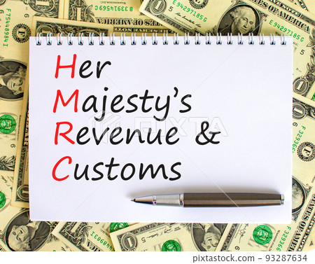 HMRC her majestys revenue and customs symbol. Concept words HMRC her majestys revenue and customs on white note on beautiful dollar background. Business HMRC revenue and customs concept. Copy space. 93287634