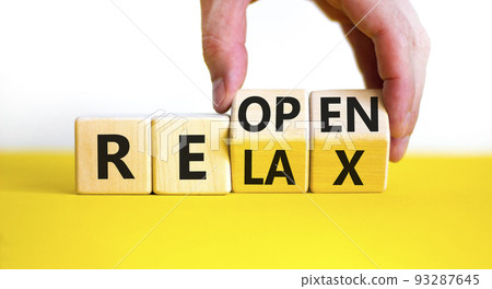 Relax and reopen symbol. Businessman turns cubes and changes the word 'relax' to 'reopen'. Beautiful yellow table, white background. Business, relax and reopen concept. Copy space. Relax and reopen symbol. Businessman turns cubes and changes the word 'relax' to 'reopen'. Beautiful yellow table, white background. Business, relax and reopen concept. Copy space. 93287645