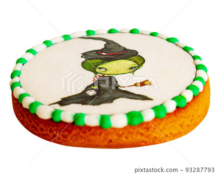 Delicious round holiday gingerbread with a witch isolated on a white background. Festive Halloween. Delicious round holiday gingerbread with a witch isolated on a white background. Festive Halloween. 93287793