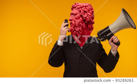Abstract modern collage. The man with the plaster head of David with a megaphone on yellow background 93289261