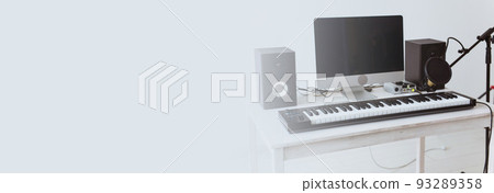 Banner synthesizer keyboard digital recording and guitars, home music record studio copy space. Leisure and hobby concept. Banner synthesizer keyboard digital recording and guitars, home music record studio copy space. Leisure and hobby concept. 93289358