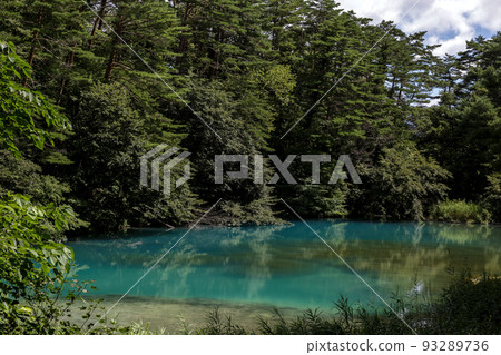 Aonuma (one of the Goshiki-numa) where the bright blue color is dazzling depending on the season and light 93289736