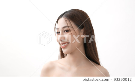 Beauty concept of 4k Resolution. Young Asian woman smiling charmingly on a white background. Beauty concept of 4k Resolution. Young Asian woman smiling charmingly on a white background. 93290012