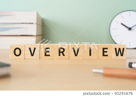 Image of overview and outlook | A desk with a block with the word "OVERVIEW" on it 93291676